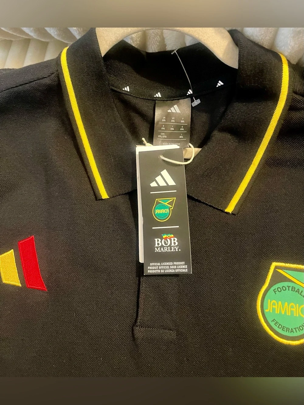 adidas Black Polo Shirt with Red, Yellow and Green Accents